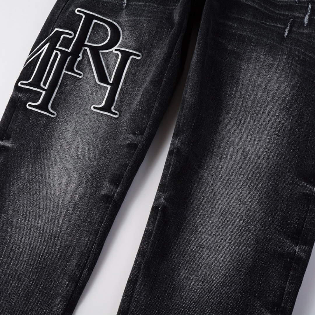 Amr Staggered Black Jeans