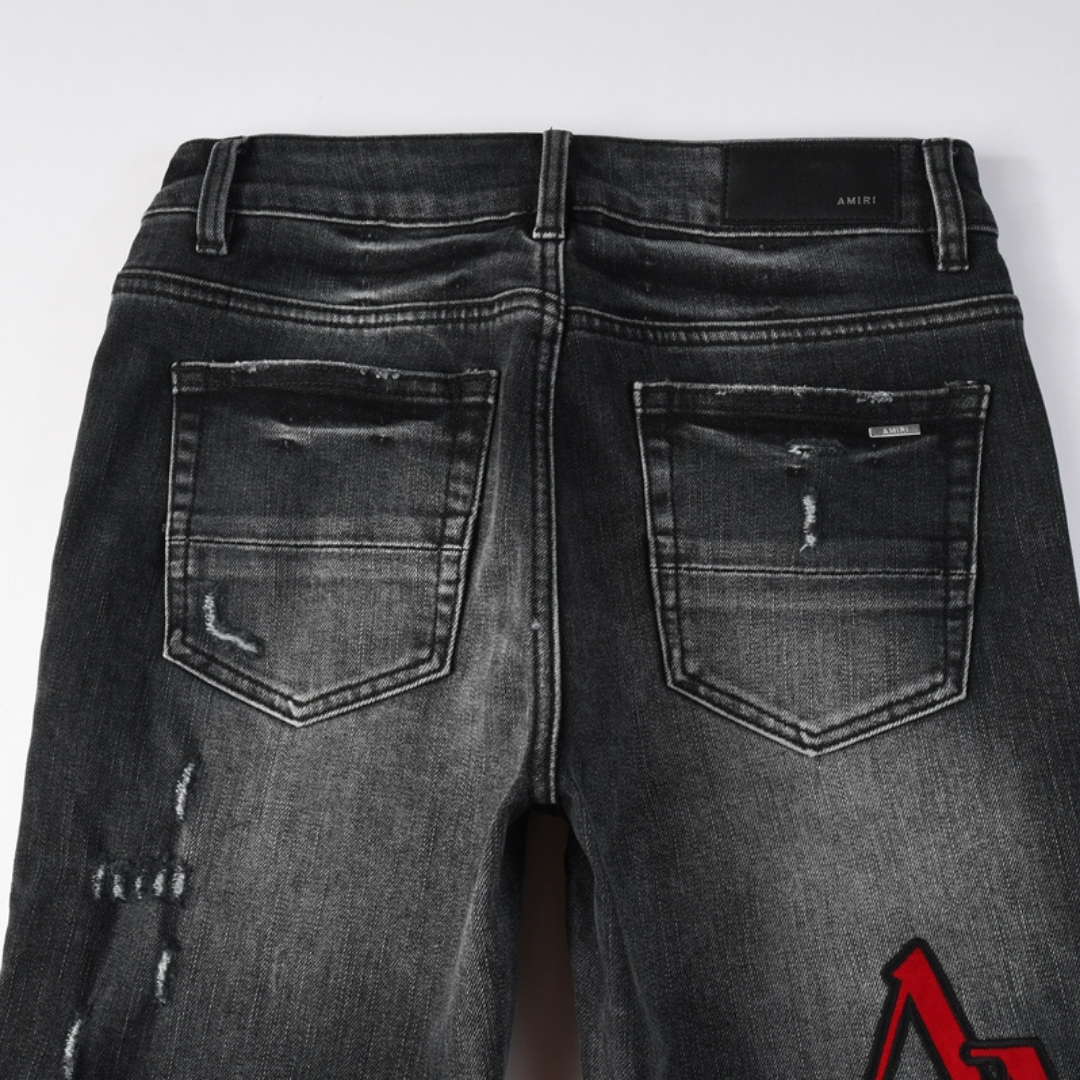 Amr Staggered Red Logo Jeans